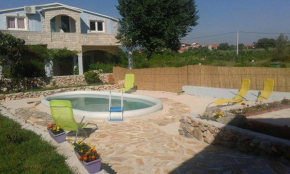 Apartments with a swimming pool Podgradina, Novigrad - 6198